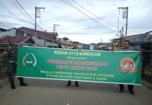 Wujud Solidaritas & Harmonisasi TNI – POLRI Pasangkan Spanduk Hari Bhayangkara Ke 72 Bersama