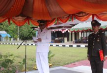 Polres Simeulue Gelar Upacara Hari Bhayangkara Ke -72, Bupati Simeulue Bacakan Amanat Presiden RI .