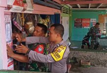 Antisipasi Virus Corona, Seluruh Personil POLRI Polres Simeulue dan TNI Kodim 0115, Tempel Maklumat Kapolri di Tempat Umum