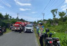 Personel Satuan Lalu Lintas Polres Simeulue Berikan Pengaturan Lalu Lintas di Lokasi Kebakaran Desa Lanting